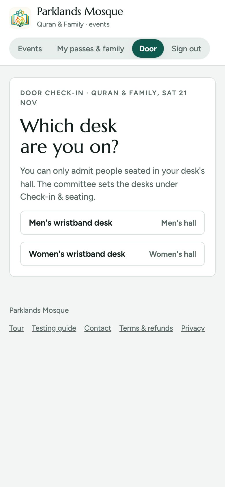 Volunteers pick their desk: men’s or women’s wristbands.